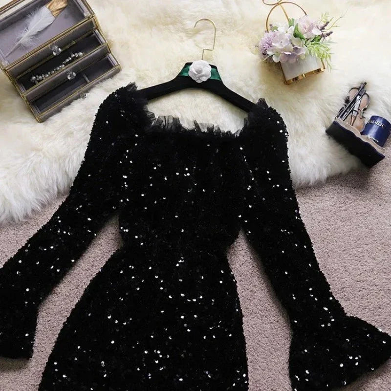 Pailletten-Kleid mit Flügelärmeln