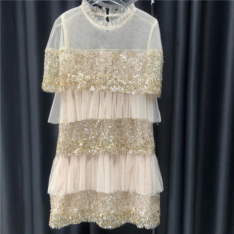 Plissierte beige Pailletten-Robe