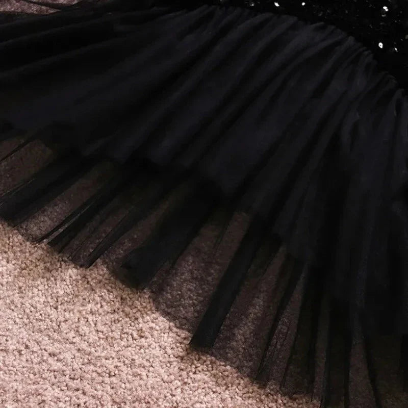 Pailletten-Kleid mit Flügelärmeln