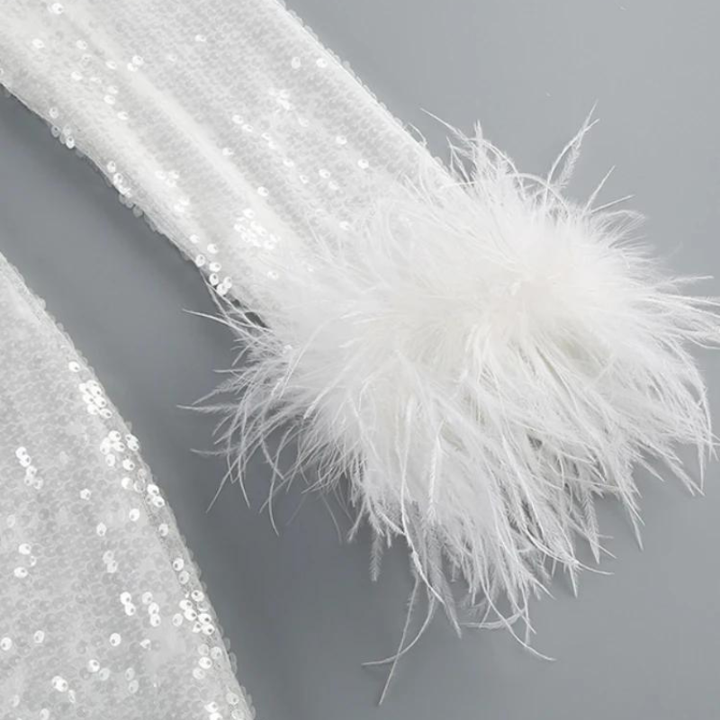 paillettenkleid mit federarmen