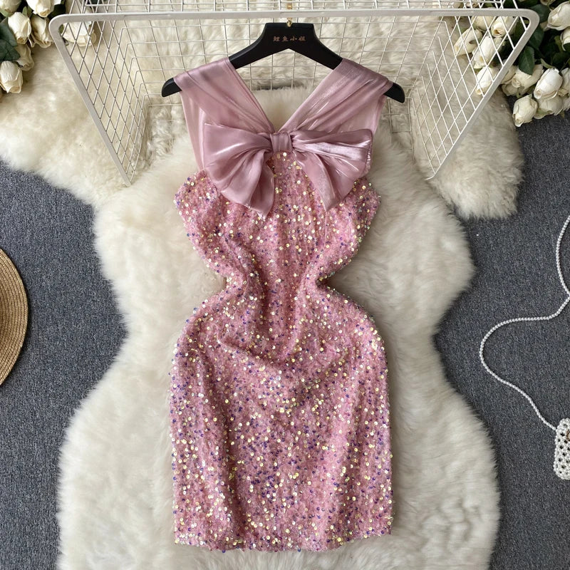 Kleid Pailletten Rosenknoten