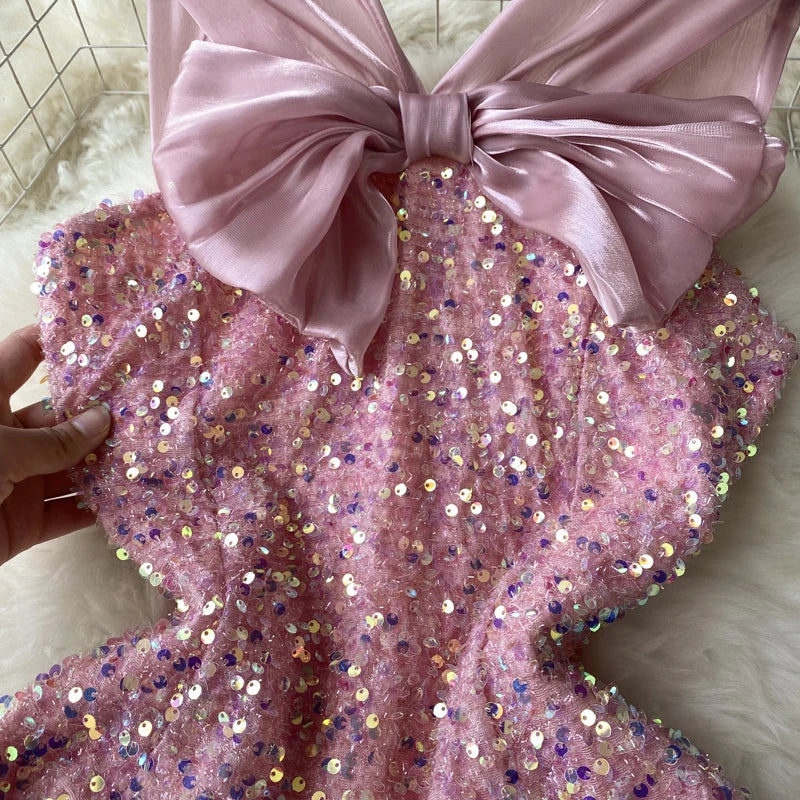Kleid Pailletten Rosenknoten
