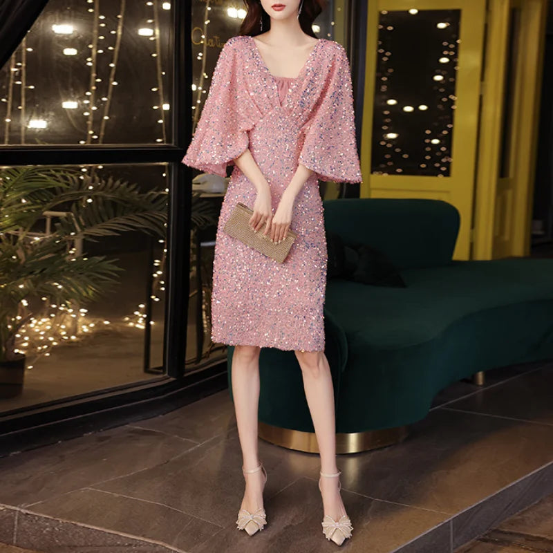 party Kleid mit Pailletten und Puffärmeln