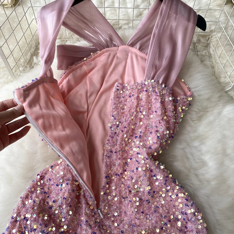 Kleid Pailletten Rosenknoten