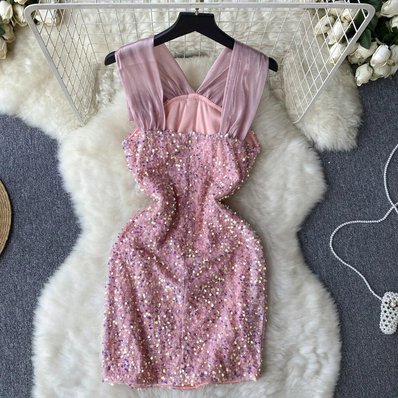 Kleid Pailletten Rosenknoten