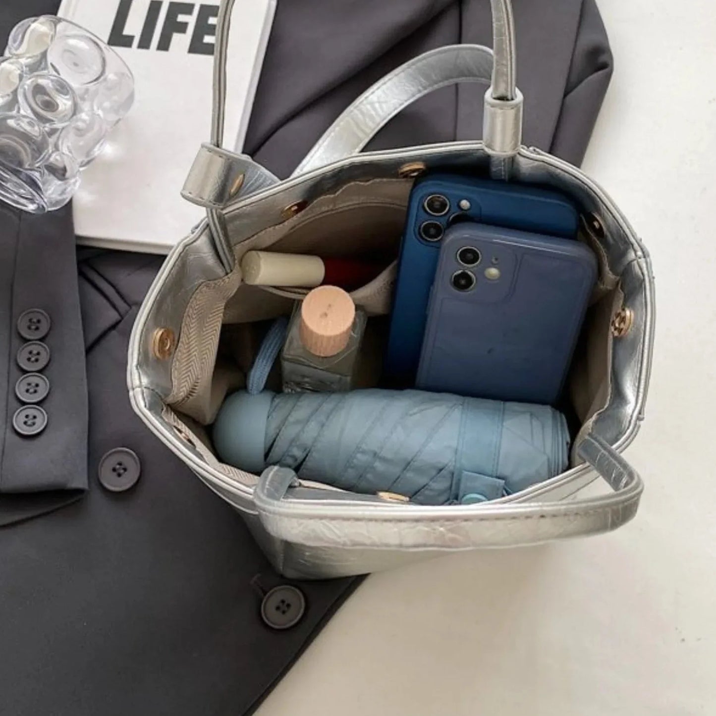 Silbernes quadratisches Tasche