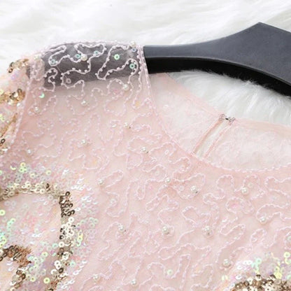 Transparente Pailletten-Kleid