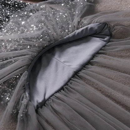 Pailletten-Kleid mit Flügelärmeln