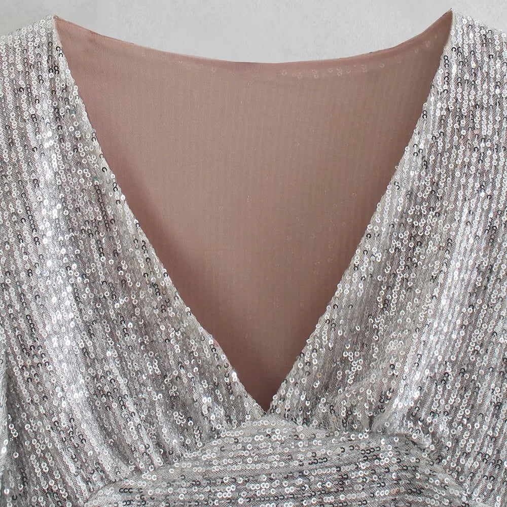 Top Paillettes Silber Langarm