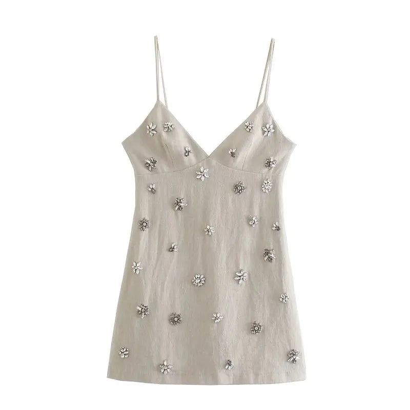 Kurzes beiges Kleid mit Glitzerblumen