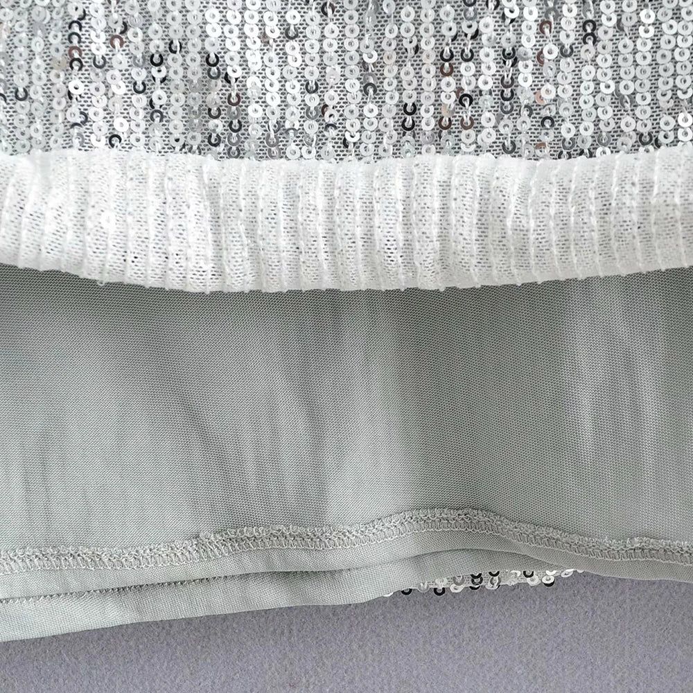 Top Paillettes Silber Langarm