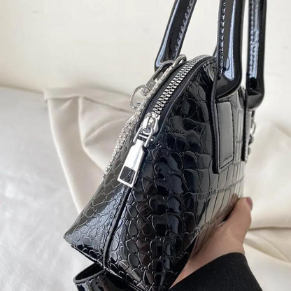 Kleine silberne Schultertasche