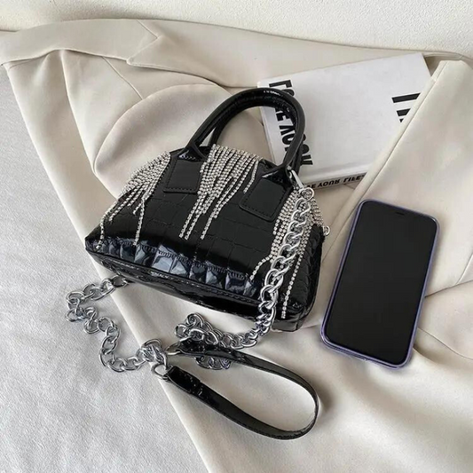 Kleine silberne Schultertasche