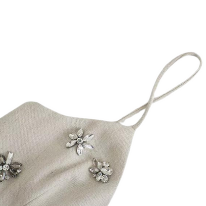 Kurzes beiges Kleid mit Glitzerblumen