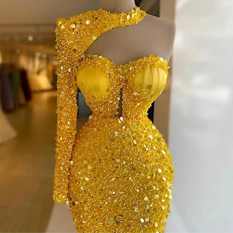 Abendkleid aus Pailletten in Gelb