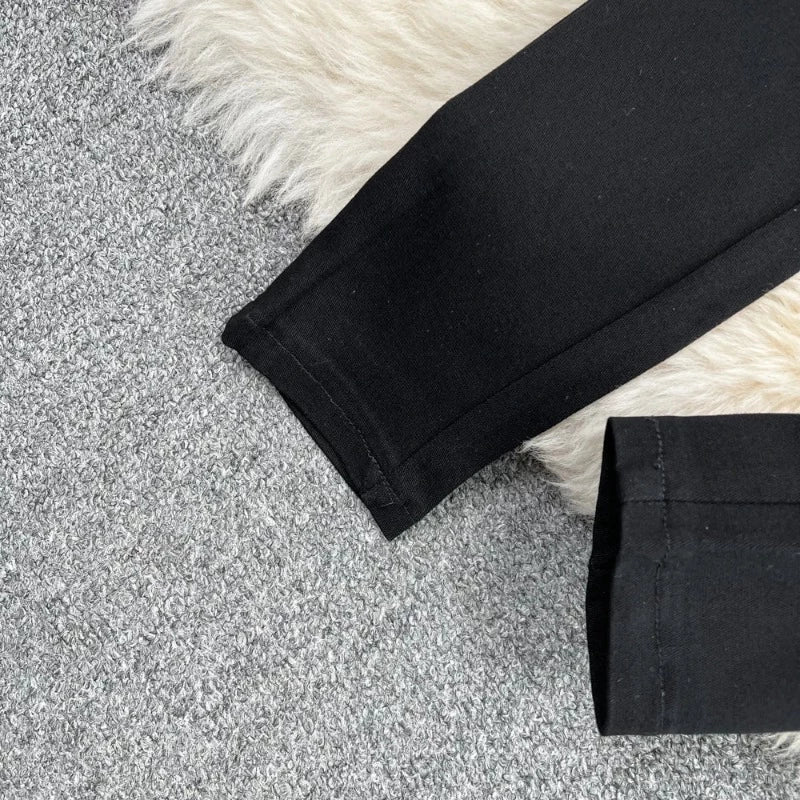 Schwarze Glitzerhose