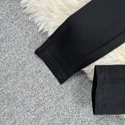 Schwarze Glitzerhose