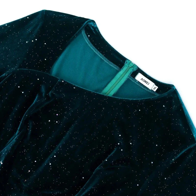 Abendkleid mit Pailletten in Grün aus Samt mit Federärmeln