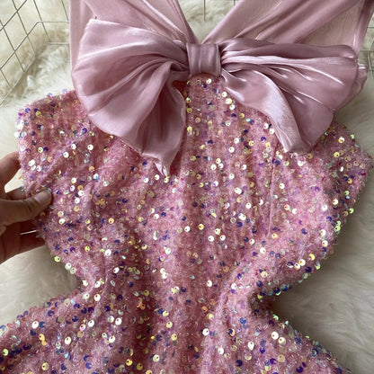 Kleid Pailletten Rosenknoten