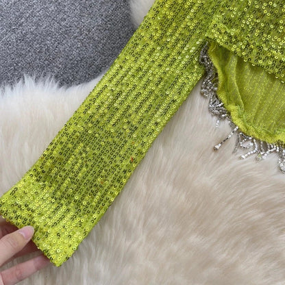 Top mit Pailletten und langen Ärmeln