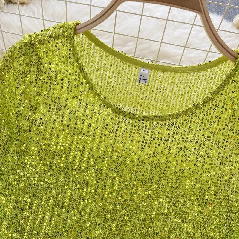 Top mit Pailletten und langen Ärmeln