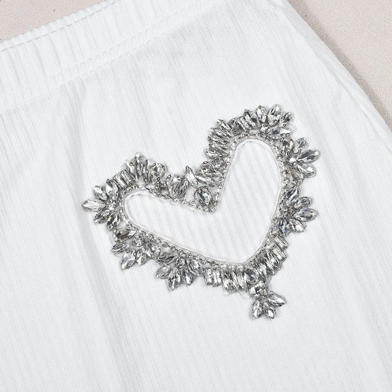 Kurzer Rock und Oberteil mit Herz-Strass