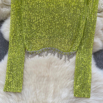 Top mit Pailletten und langen Ärmeln