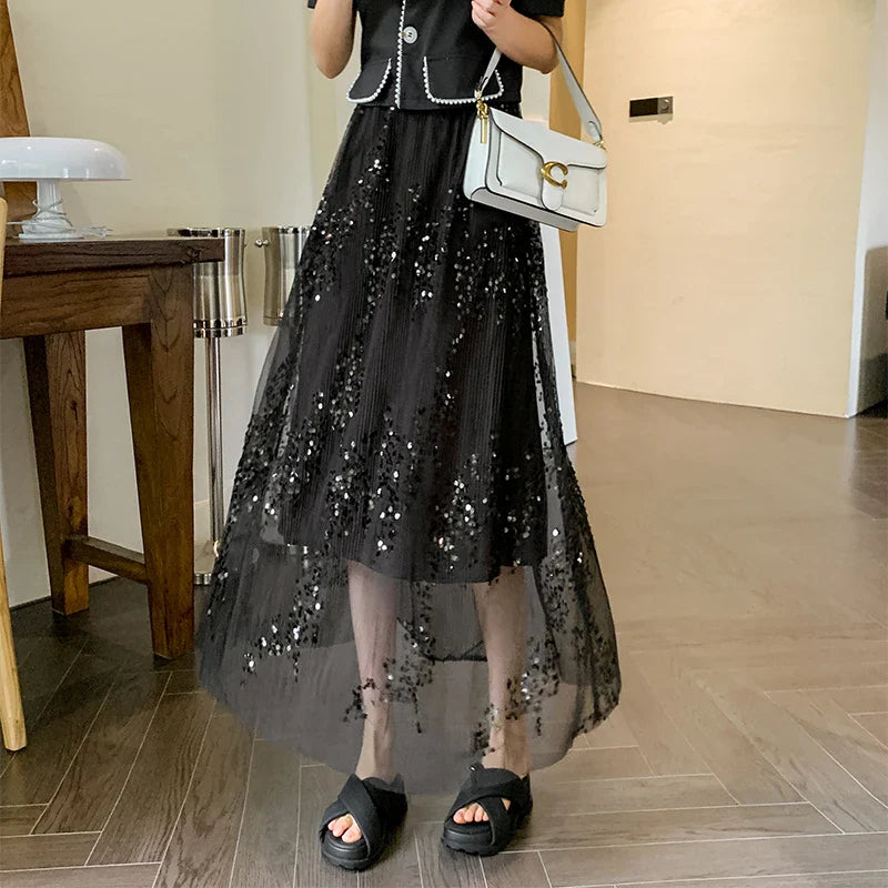 Paillettenrock mit transparentem Futter