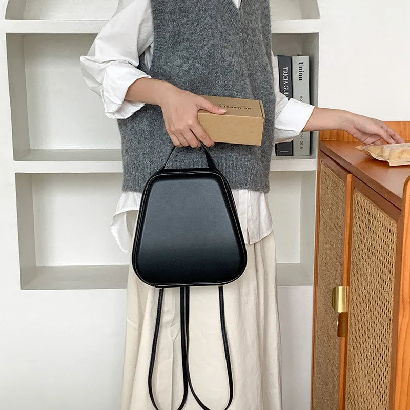 Kleiner silberner Rucksack