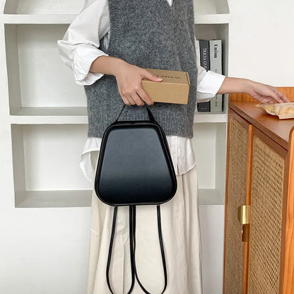 Kleiner silberner Rucksack