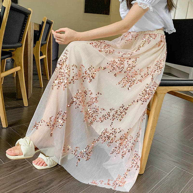 Paillettenrock mit transparentem Futter