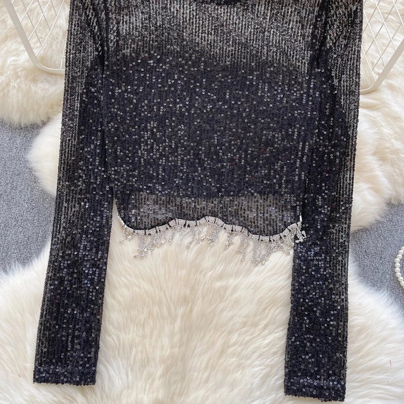 Top mit Pailletten und langen Ärmeln