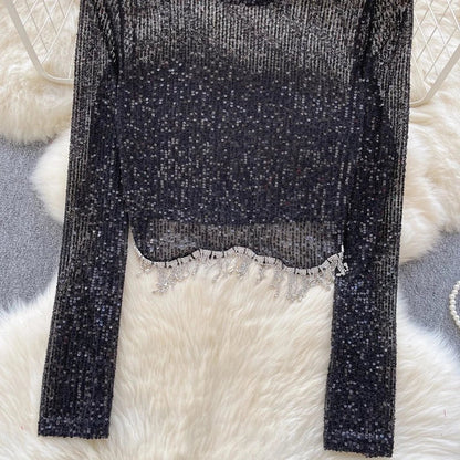 Top mit Pailletten und langen Ärmeln