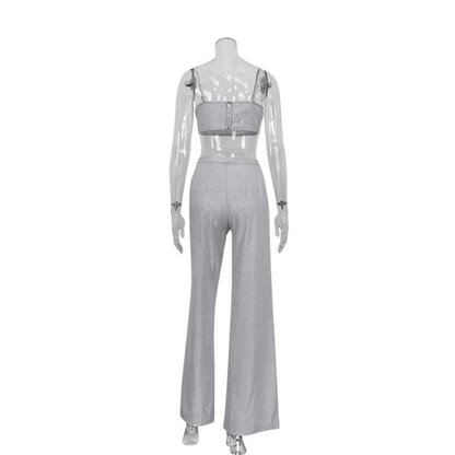 Haut und Hose mit silbernen Pailletten
